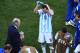 SAO PAULO, BRAZIL - JULY 01: Head coach Alejandro Sabella of Argentina speaks to his players as Lionel Messi takes on fluids during the 2014 FIFA World Cup Brazil Round of 16 match between Argentina and Switzerland at Arena de Sao Paulo on July 1, 2014 in