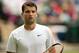 Jun 25, 2014; London, United Kingdom; Grigor Dimitrov (BUL) during his match against Luke Saville (AUS) on day three of the 2014 Wimbledon Championships at the All England Lawn and Tennis Club. Mandatory Credit: Susan Mullane-USA TODAY Sports