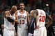 CHICAGO, IL - JANUARY 24: (L-R) Taj Gibson #22, Joakim Noah #13 and Tony Snell #20 of the Chicago Bulls listen to head coach Tom Thibodeau during a time out against the Los Angeles Clippers at the United Center on January 24, 2014 in Chicago, Illinois. Th