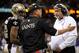 NEW ORLEANS, LA - OCTOBER 27: Head Coach Sean Payton (C) talks with Defensive Coordinator Rob Ryan (R) of the New Orleans Saints during a time out against the Buffalo Bills at Mercedes-Benz Superdome on October 27, 2013 in New Orleans, Louisiana. (Photo
