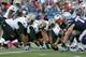 Oct 13, 2013; Foxborough, MA, USA; New England Patriots offense line up against the New Orleans Saints defense during the first quarter at Gillette Stadium. The Patriots defeated the Saints 30-27. Mandatory Credit: Stew Milne-USA TODAY Sports