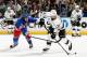 NEW YORK, NY - JUNE 11: Brian Boyle #22 of the New York Rangers tries to stop Willie Mitchell #33 of the Los Angeles Kings in the first period of Game Four of the 2014 Stanley Cup Final at Madison Square Garden on June 11, 2014 in New York City. (Photo