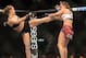Dec 28, 2013; Las Vegas, NV, USA; Ronda Rousey (red gloves) and Miesha Tate (blue gloves) during their UFC Women's Bantamweight Championship Bout at the MGM Grand Garden Arena. Ronda Rousey won Mandatory Credit: Jayne Kamin-Oncea-USA TODAY Sports