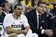 Dec 28, 2013; Ann Arbor, MI, USA; Michigan Wolverines forward Jordan Morgan (52) and forward Mitch McGary (4) sit on the bench in the second half against the Holy Cross Crusaders at Crisler Arena. Michigan won 88-66. Mandatory Credit: Rick Osentoski-USA T