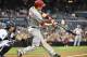 SAN DIEGO, CA - JUNE 30: Todd Frazier #21 of the Cincinnati Reds hits a single during the third inning of a baseball game against the San Diego Padres at Petco Park June 30, 2014 in San Diego, California. (Photo by Denis Poroy/Getty Images)