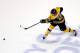 BOSTON, MA - MAY 14: Torey Krug #47 of the Boston Bruins takes a shot against the Montreal Canadiens during Game Seven of the Second Round of the 2014 NHL Stanley Cup Playoffs at the TD Garden on May 14, 2014 in Boston, Massachusetts. (Photo by Alex Trau
