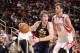 HOUSTON, TX - DECEMBER 1: Gordon Hayward #20 of the Utah Jazz drives the ball against Chandler Parsons #25 of the Houston Rockets on December 1, 2012 at the Toyota Center in Houston, Texas. NOTE TO USER: User expressly acknowledges and agrees that, by dow