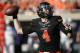 STILLWATER, OK - OCTOBER 5: Quarterback J.W. Walsh #4 of the Oklahoma State Cowboys looks to throw against the Kansas State Wildcats October 5, 2013 at Boone Pickens Stadium in Stillwater, Oklahoma. The Cowboys defeated the Wildcats 33-29. (Photo by Br