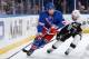NEW YORK, NY - MAY 05: Kevin Klein #8 of the New York Rangers skates with the puck against Lee Stempniak #22 of the Pittsburgh Penguins in Game Three of the Second Round of the 2014 Stanley Cup Playoffs at Madison Square Garden on May 05, 2014 in New Yor