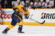 NASHVILLE, TN - APRIL 12: Michael Del Zotto #5 of the Nashville Predators takes a slapshot against the Chicago Blackhawks during an NHL game at Bridgestone Arena on April 12, 2014 in Nashville, Tennessee. (Photo by John Russell/NHLI via Getty Images)