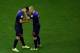 SALVADOR, BRAZIL - JUNE 13: Robin van Persie of the Netherlands (L) passes off the captain's armband to Arjen Robben as he leaves the game during the 2014 FIFA World Cup Brazil Group B match between Spain and Netherlands at Arena Fonte Nova on June 13, 2