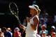 LONDON, ENGLAND - JULY 03: Eugenie Bouchard of Canada celebrates match point and winning her Ladies' Singles semi-final match against Simona Halep of Romania on day ten of the Wimbledon Lawn Tennis Championships at the All England Lawn Tennis and Croquet