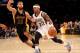 LOS ANGELES, CA - FEBRUARY 28: Isaiah Thomas #22 of the Sacramento Kings drives past Kendall Marshall #12 of the Los Angeles Lakers at Staples Center on February 28, 2014 in Los Angeles, California. NOTE TO USER: User expressly acknowledges and agrees t