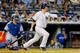 NEW YORK, NY - JUNE 18: Brian McCann #34 of the New York Yankees follows through on a fourth inning two-run home run against the Toronto Blue Jays at Yankee Stadium on June 18, 2014 in the Bronx borough of New York City. (Photo by Jim McIsaac/Getty Imag