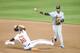BALTIMORE, MD - JUNE 23: Alexei Ramirez #10 of the Chicago White Sox forces out Caleb Joseph #36 of the Baltimore Orioles at second base in the sixth inning and turns the double play on Nick Markakis (not pictured) on June 23, 2014 at Oriole Park at Camd