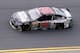 Jul 3, 2014; Daytona Beach, FL, USA; NASCAR Sprint Cup Series driver Dale Earnhardt, Jr. (88) drives through turn four during practice for the Coke Zero 400 at Daytona International Speedway. Mandatory Credit: Rob Foldy-USA TODAY Sports