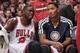 Nov 11, 2013; Chicago, IL, USA; Chicago Bulls small forward Luol Deng (9) talks with point guard Derrick Rose (1) on the bench during the second half against the Cleveland Cavaliers at the United Center. The Bulls won 96-81. Mandatory Credit: Rob Grabowsk