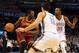 Feb 26, 2014; Oklahoma City, OK, USA; Cleveland Cavaliers small forward Luol Deng (9) handles the ball against Oklahoma City Thunder center Steven Adams (12) and Oklahoma City Thunder small forward Kevin Durant (35) during the second quarter at Chesapeake