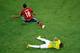 FORTALEZA, BRAZIL - JULY 04: Neymar of Brazil lies on the pitch after a challenge by Juan Camilo Zuniga of Colombia during the 2014 FIFA World Cup Brazil Quarter Final match between Brazil and Colombia at Castelao on July 4, 2014 in Fortaleza, Brazil.