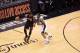 SAN ANTONIO, TX - JUNE 15: LeBron James #6 of the Miami Heat drives to the basket against the San Antonio Spurs during Game Five of the 2014 NBA Finals between the Miami Heat and San Antonio Spurs at AT&T Center on June 15, 2014 in San Antonio, Texas. NOT