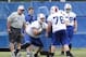 Jun 18, 2014; Buffalo, NY, USA; Buffalo Bills offensive lineman Kraig Urbik (60) performs a drill against center Macky MacPherson (76) during the Bills Minicamp at Ralph Wilson Stadium. Mandatory Credit: Kevin Hoffman-USA TODAY Sports