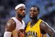 May 30, 2014; Miami, FL, USA; Miami Heat forward LeBron James (left) stands next to Indiana Pacers guard Lance Stephenson (right) during the first half in game six of the Eastern Conference Finals of the 2014 NBA Playoffs at American Airlines Arena. Manda