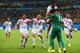 RECIFE, BRAZIL - JUNE 29: Keylor Navas of Costa Rica is swarmed by teammates in celebration after defeating Greece in a penalty shootout during the 2014 FIFA World Cup Brazil Round of 16 match between Costa Rica and Greece at Arena Pernambuco on June 29,