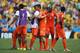 FORTALEZA, BRAZIL - JUNE 29: Klaas-Jan Huntelaar #19 of the Netherlands celebrates with team mates after defeating Mexico 2-1 during the 2014 FIFA World Cup Brazil Round of 16 match between Netherlands and Mexico at Castelao on June 29, 2014 in Fortaleza