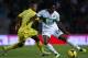 ELCHE, SPAIN - NOVEMBER 04: Carlos Sanchez (R) of Elche competes for the ball with Ikechukwu Uche of Villarreal during the La Liga match between Elche CF and Villarreal CF at Estadio Manuel Martinez Valero on November 4, 2013 in Elche, Spain. (Photo by
