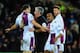 CARDIFF, WALES - FEBRUARY 11: Ron Vlaar of Villa and Fabian Delph (c) have words with referee Chris Foy during the Barclays Premier League match between Cardiff City and Aston Villa at Cardiff City Stadium on February 11, 2014 in Cardiff, Wales. (Photo