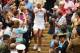 LONDON, ENGLAND - JULY 05: Petra Kvitova of Czech Republic in amongst the fans after going up to the players box to celebrate with her coaching team after winning the Ladies' Singles final match against Eugenie Bouchard of Canada on day twelve of the Wim