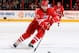 RALEIGH, NC - FEBRUARY 04: Brett Bellemore #73 of the Carolina Hurricanes collects a loose puck during an NHL game against the Winnipeg Jets at PNC Arena on February 4, 2014 in Raleigh, North Carolina. (Photo by Gregg Forwerck/NHLI via Getty Images)