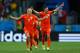 SALVADOR, BRAZIL - JULY 05: Arjen Robben and Robin van Persie of the Netherlands celebrate after defeating Costa Rica in a penalty shootout during the 2014 FIFA World Cup Brazil Quarter Final match between the Netherlands and Costa Rica at Arena Fonte No