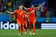 SALVADOR, BRAZIL - JULY 05: Arjen Robben and Robin van Persie of the Netherlands celebrate after defeating Costa Rica in a penalty shootout during the 2014 FIFA World Cup Brazil Quarter Final match between the Netherlands and Costa Rica at Arena Fonte No