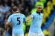 MANCHESTER, ENGLAND - DECEMBER 09: Vincent Kompany of Manchester City hands the Captain's armband to team-mate Pablo Zabaleta during the Barclays Premier League match between Manchester City and Manchester United at the Etihad Stadium on December 9, 2012