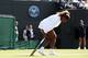 LONDON, ENGLAND - JULY 01: Serena Williams of the United States struggles during the warm up prior her Ladies Doubles second round match with Venus against Kristina Barrois of Germany and Stefanie Voegele of Switzerland on day eight of the Wimbledon Lawn