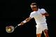 LONDON, ENGLAND - JULY 06: Roger Federer of Switzerland plays a forehand return during the Gentlemen's Singles Final match against Novak Djokovic of Serbia on day thirteen of the Wimbledon Lawn Tennis Championships at the All England Lawn Tennis and Croq