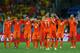 SALVADOR, BRAZIL - JULY 05: Arjen Robben (#11) of the Netherlands is congratulated by captain Robin Van Persie after converting his penalty kick during the penalty shootout during the 2014 FIFA World Cup Brazil Quarter Final match between the Netherlands