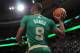 BOSTON, MA - MARCH 14: Rajon Rondo #9 of the Boston Celtics passes the ball against the Phoenix Suns on March 14, 2014 at the TD Garden in Boston, Massachusetts. NOTE TO USER: User expressly acknowledges and agrees that, by downloading and or using this