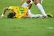 FORTALEZA, BRAZIL - JULY 04: Neymar of Brazil lies on the field after a challenge as teammate Marcelo reacts during the 2014 FIFA World Cup Brazil Quarter Final match between Brazil and Colombia at Castelao on July 4, 2014 in Fortaleza, Brazil. (Photo b