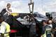 Rosberg's stricken Mercedes is returned to the pits.