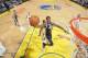 OAKLAND, CA - APRIL 6: Marvin Williams #2 of the Utah Jazz drives to the basket against the Golden State Warriors on April 6, 2014 at Oracle Arena in Oakland, California. NOTE TO USER: User expressly acknowledges and agrees that, by downloading and or usi