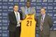 Jun 27, 2014; Independence, OH, USA; Cleveland Cavaliers first round pick Andrew Wiggins (21) is introduced by head coach David Blatt (left) and general manager David Griffin at Cleveland Clinic Courts. Mandatory Credit: David Richard-USA TODAY Sports