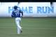 TORONTO, CANADA - JULY 2: Jose Bautista #19 of the Toronto Blue Jays circles the bases after hitting a solo home run in the first inning during MLB game action against the Milwaukee Brewers on July 2, 2014 at Rogers Centre in Toronto, Ontario, Canada. (Ph