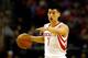 HOUSTON, TX - APRIL 04: Jeremy Lin #7 of the Houston Rockets points down court against the Oklahoma City Thunder during a game at the Toyota Center on April 4, 2014 in Houston, Texas. NOTE TO USER: User expressly acknowledges and agrees that, by download