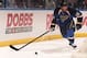 ST. LOUIS, MO - APRIL 08: Derek Roy #12 of the St. Louis Blues handles the puck against the Washington Capitals during an NHL game on April 8, 2014 at Scottrade Center in St. Louis, Missouri. (Photo by Mark Buckner/NHLI via Getty Images)