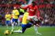 MANCHESTER, ENGLAND - DECEMBER 07: Nani of Manchester United goes past the tackle from Michael Williamson of Newcastle during the Barclays Premier League match between Manchester United and Newcastle United at Old Trafford on December 7, 2013 in Manchest