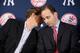 Managing general partner/co-chairperson Hal Steinbrenner (left) leans in to chat with Cashman in 2009.