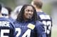Jun 17, 2014; Renton, WA, USA; Seattle Seahawks running back Marshawn Lynch (24) talks with a teammate during minicamp at the Virginia Mason Athletic Center. Mandatory Credit: Joe Nicholson-USA TODAY Sports