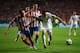 LISBON, PORTUGAL - MAY 24: Angel Di Maria of Real Madrid takes on Juanfran (L) and Gabi of Club Atletico de Madrid (C) during the UEFA Champions League Final between Real Madrid and Atletico de Madrid at Estadio da Luz on May 24, 2014 in Lisbon, Portugal